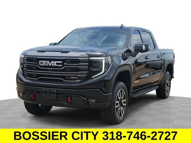 2023 GMC Sierra 1500 AT4 in Onyx Black — front three-quarter view